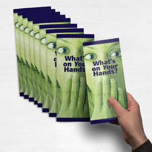 Student holding What's On Your Hand pamphlet.
