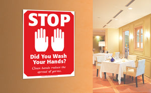 Stop! Did you wash your hands? 8.5 by 11 inch poster hanging on wall inside a restaurant.