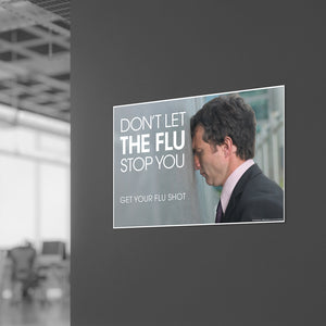 Don't Let the Flu Stop You. 11" X 17" laminated poster hanging on wall in a business office.