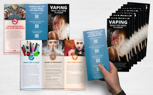 Hand holding the Vaping What You Need to Know pamphlet.